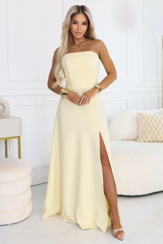Rochie maxi Numoco în culoarea galben unt, tip corset fără bretele, cu șlit pe picior și legătură la spate - producție poloneză.}